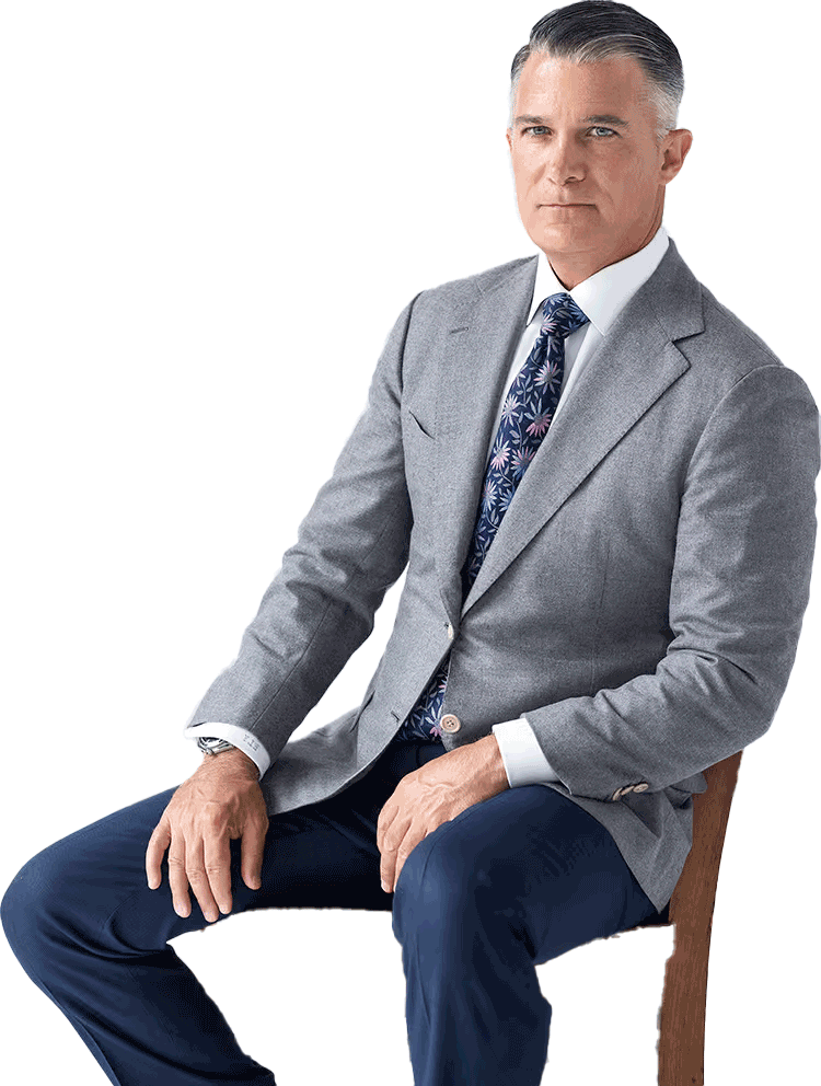 Eric Young sitting on a chair