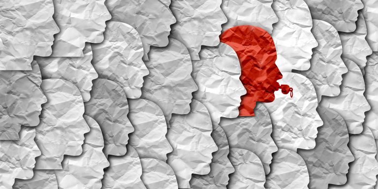 Security Agencies and Whistleblowers 3 Gray Faces with one Red Face with a Whistle