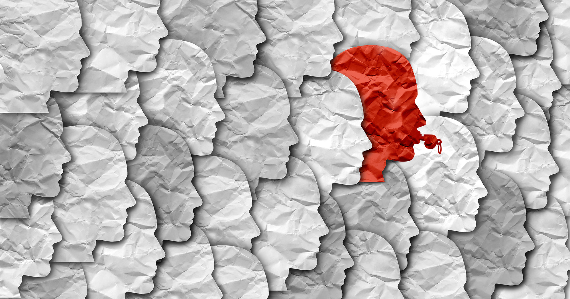 Red silhouette of a whistleblower among crumpled white profile outlines, symbolizing the protection of whistleblowers in national security as discussed in the Presidential Policy Directive.