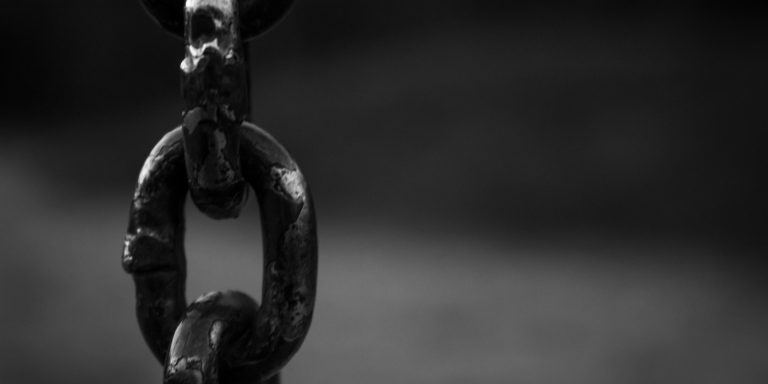 Telia Settles FCPA Bribery Investigation for $965 Million 9 Closeup of Chain, representing bribery investigation