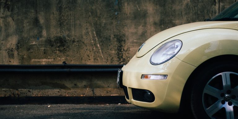 NHTSA Fines Takata Up to $200 Million for Airbag Issues 8 Beige Volkswagen Beetle, representing the $4 Billion Fine for Volkswagen and NHTSA Whistleblower Rules