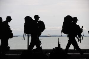 Whistleblower Resources 6 Silhouette of Soldiers Walking, representing military contractors
