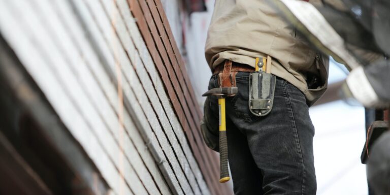 Independent Watchdogs on OSHA Whistleblowers: A Broken Reflection 8 Man Wearing Black Denim Pants With Carrying Hammer on Holster