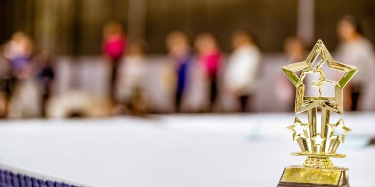 SEC's Largest Whistleblower Award: $279 Million Granted 5 Photograph of a gold award, representing the SEC's largest whistleblower award in history