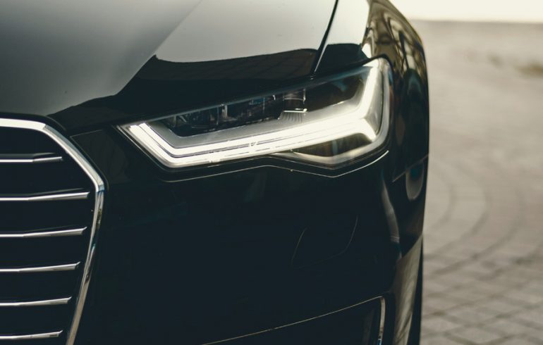 Close-up of the Front of a Black Sedan Automobile